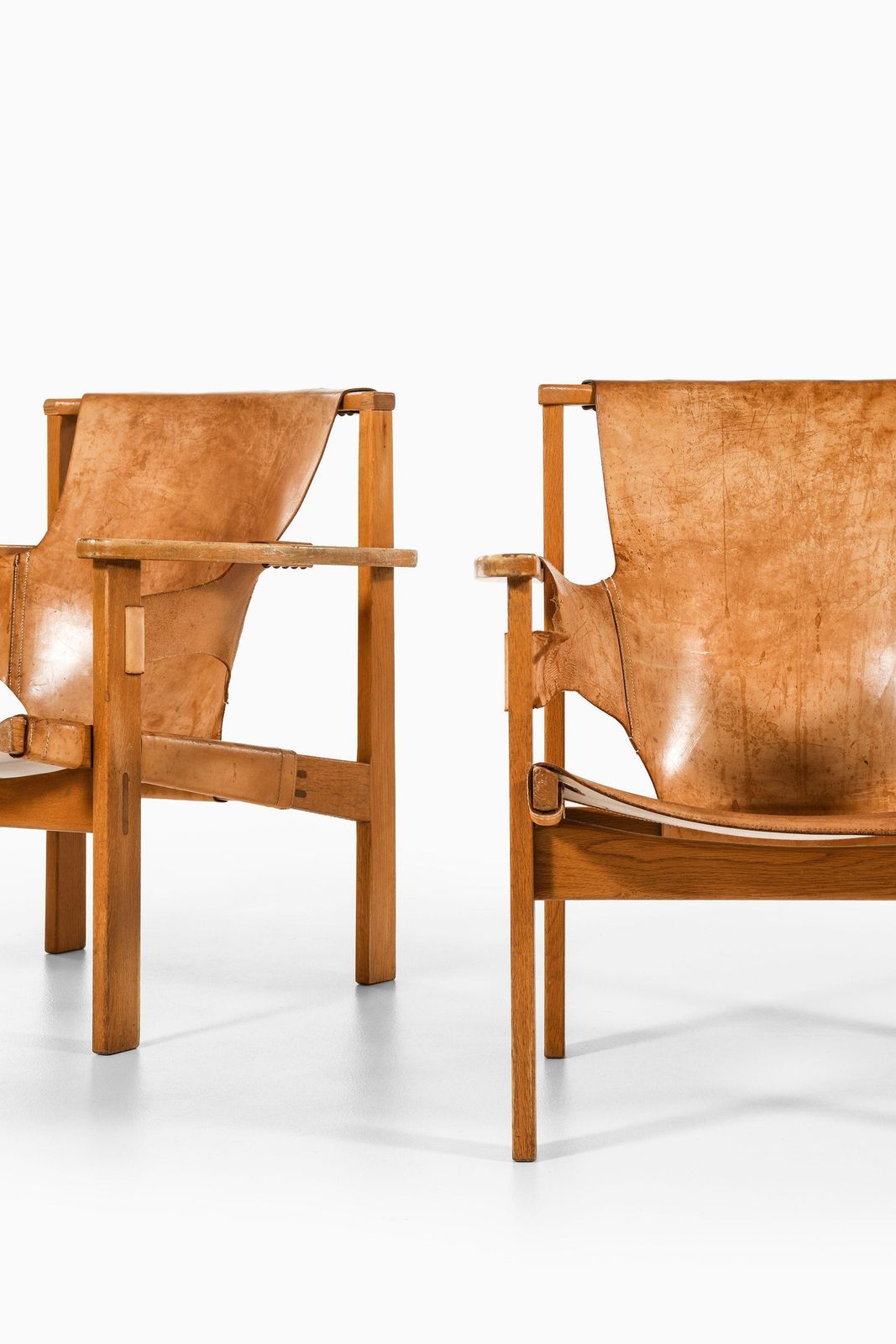 Pair Of Trienna Easy Chairs In Oak & Original Leather By Carl Axel Acking, 1957 photo vinterior
