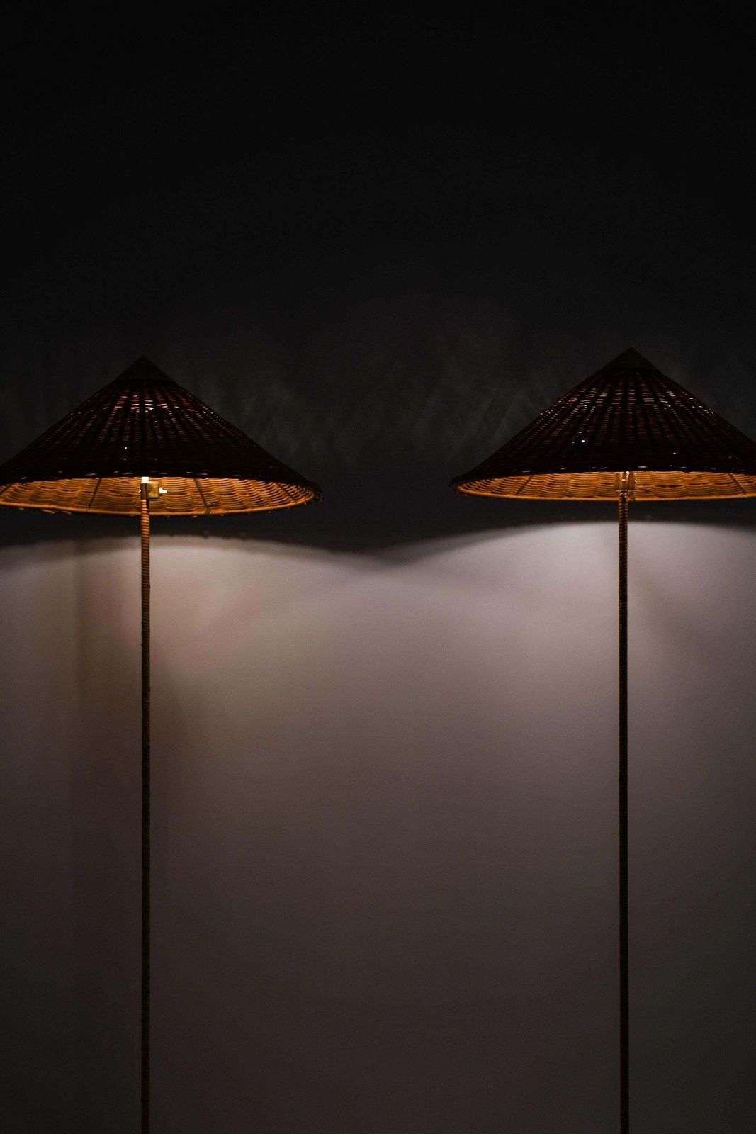Pair Of Floor Lamps In Brass, Cane And Rattan Shades By Paavo Tynell, 1950's photo vintage