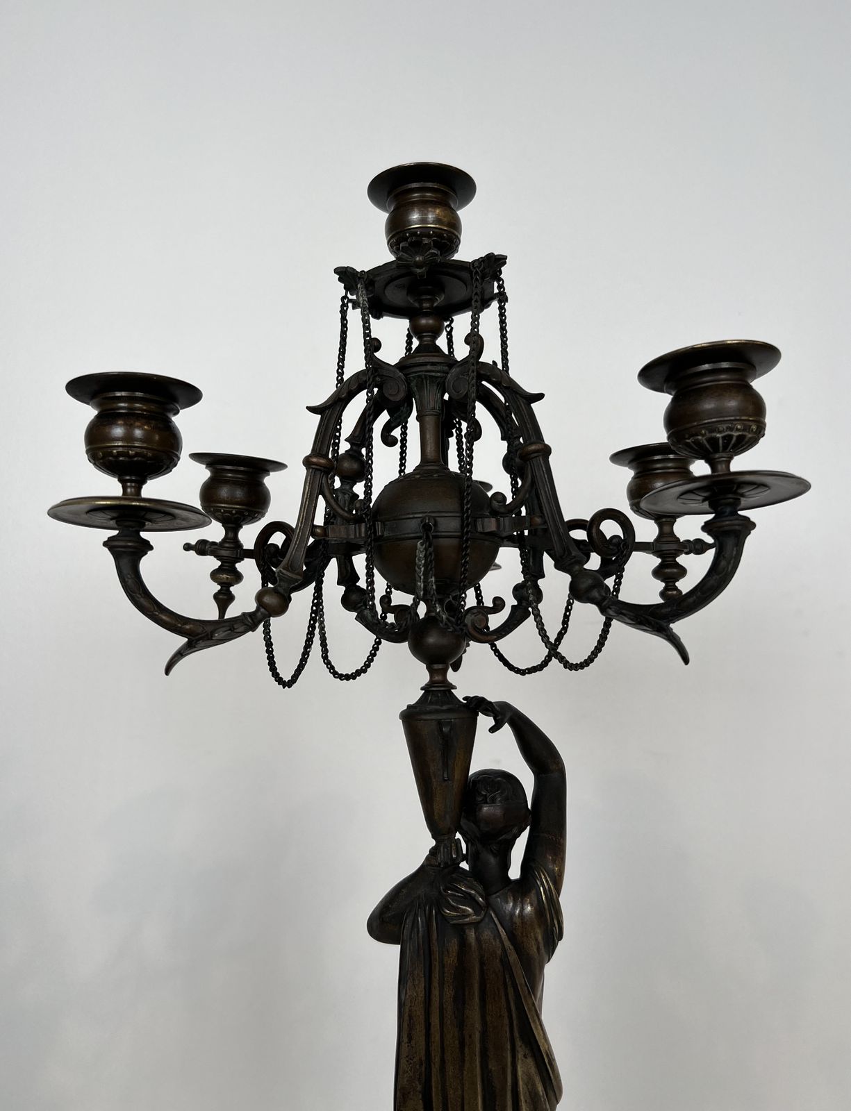 photo vintage Pair Of Important Patinated Bronze Candelabras Featuring Caryatids Holding 5 Candlesticks In The Louis Valentin Elias Robert Style
