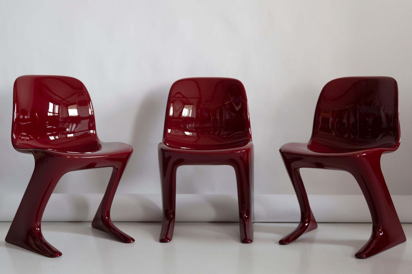 Set Of Six Red Wine Kangaroo Chairs Designed By Ernst Moeckl, Germany, 1968 photo furniture
