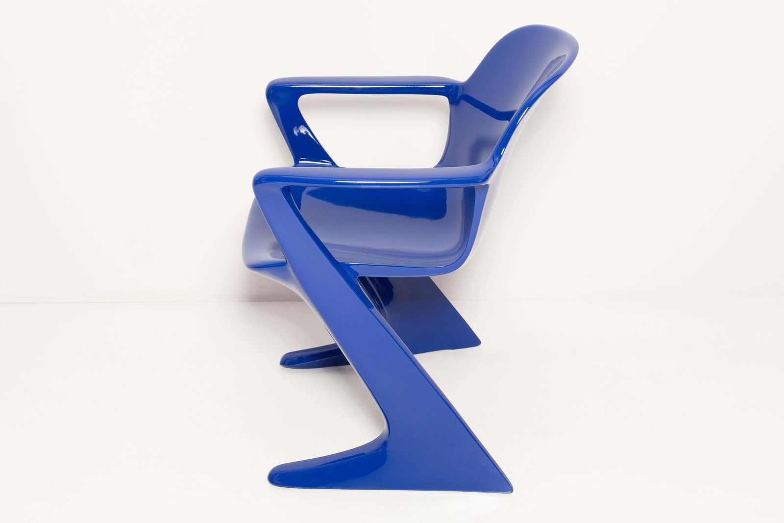 photo furniture Set Of Eight Ultramarine Blue Kangaroo Chairs, By Ernst Moeckl, Germany, 1968