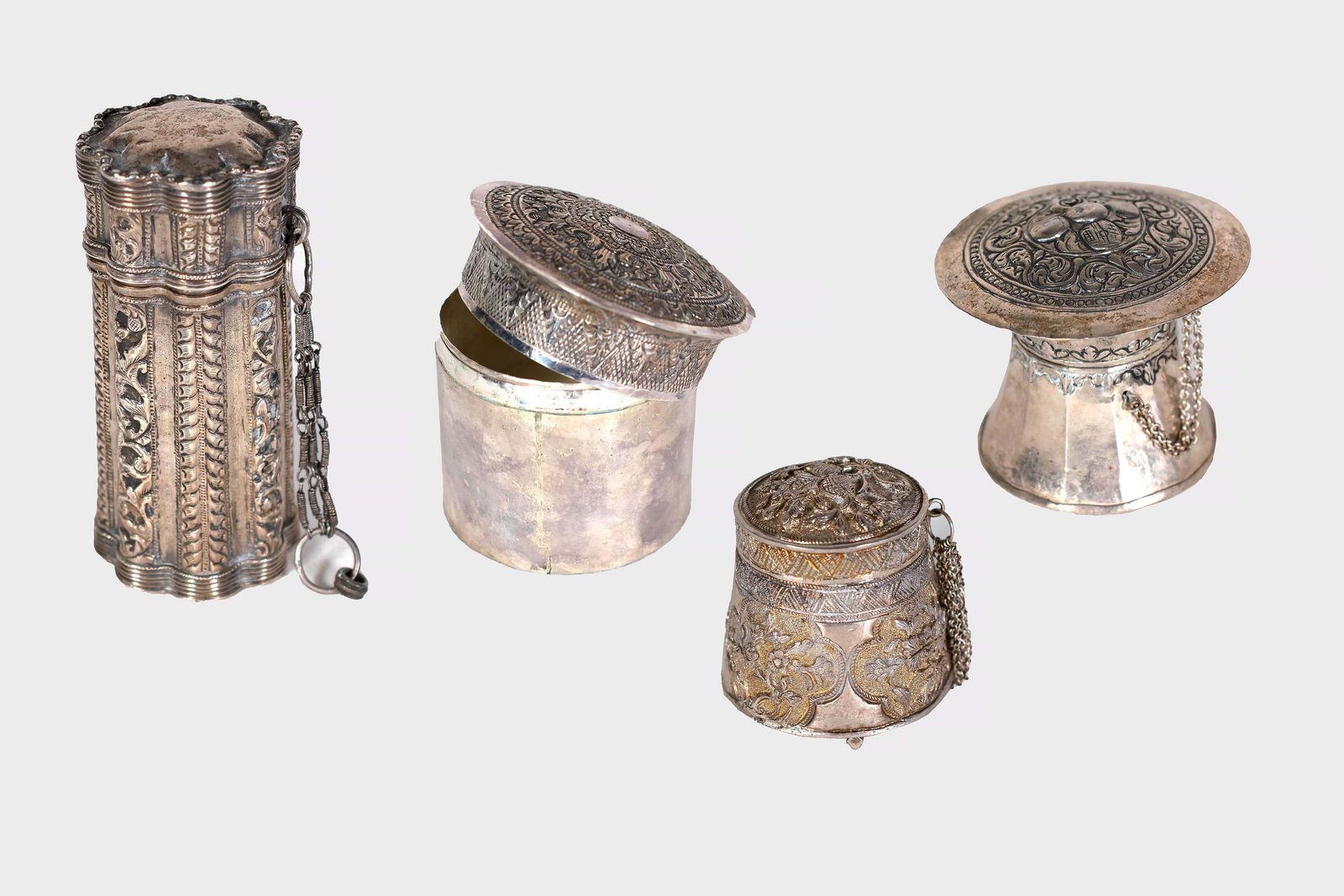 Four Vessels With Indonesian Lids In Repoussé Silver photo Home Decor