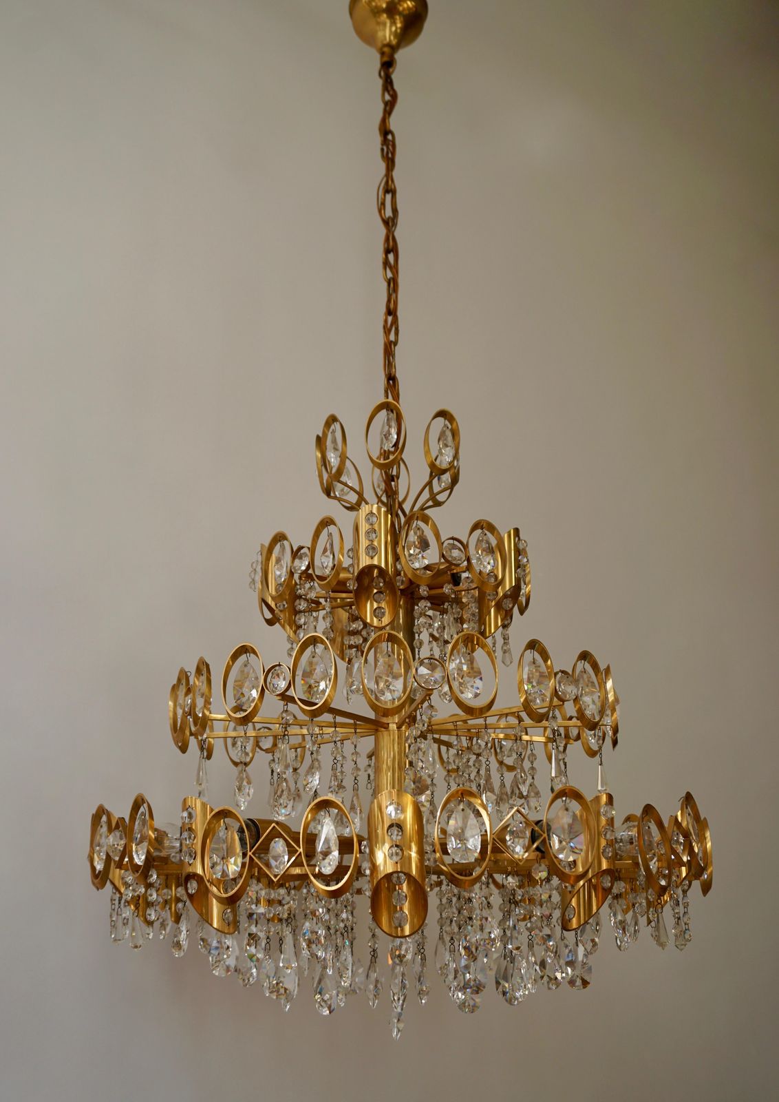 photo buy Glamorous Hollywood Regency Gilt Brass And Crystal Palwa Chandelier