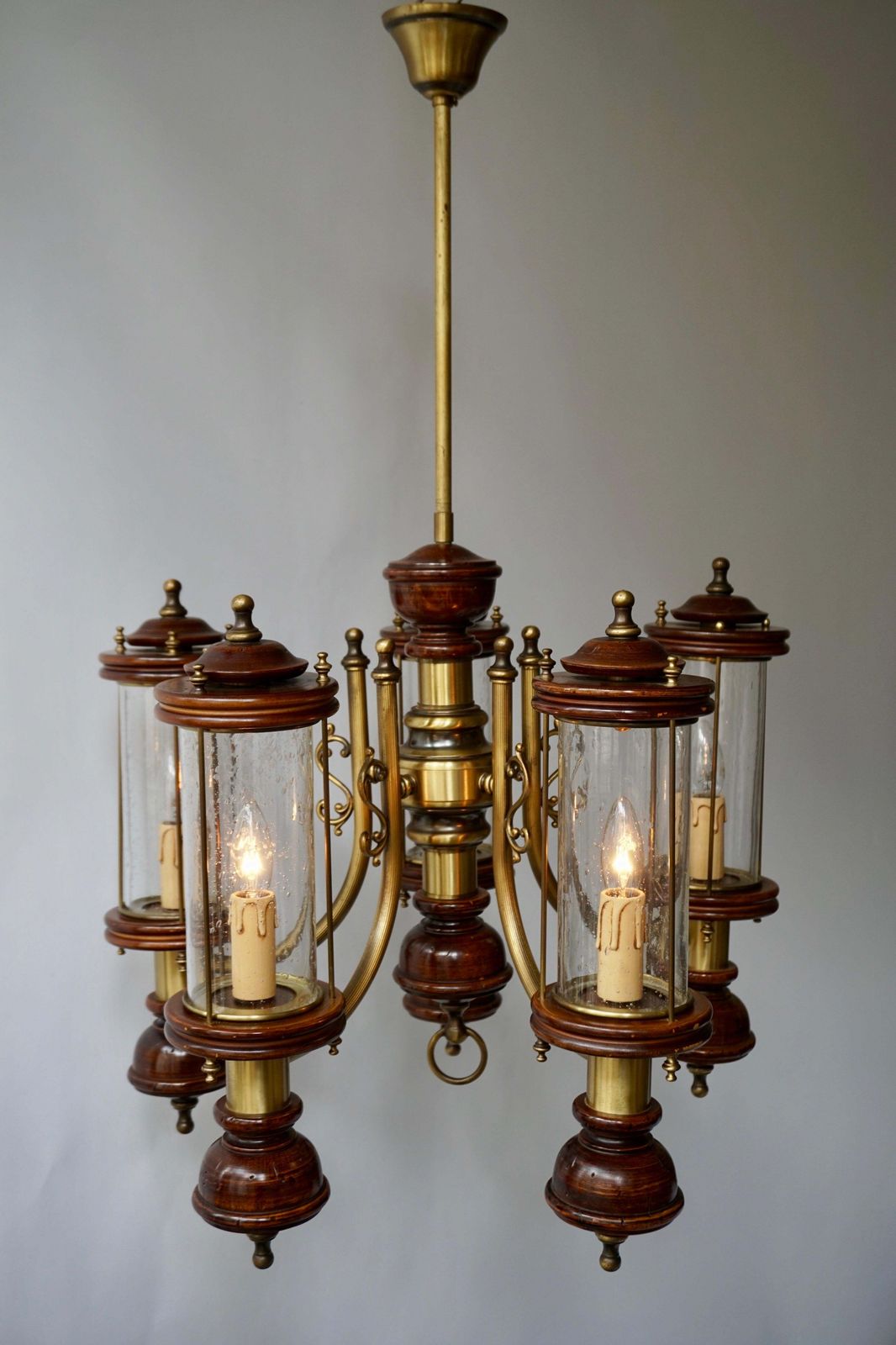 Chandelier Is Glass, Brass And Wood photo Lighting
