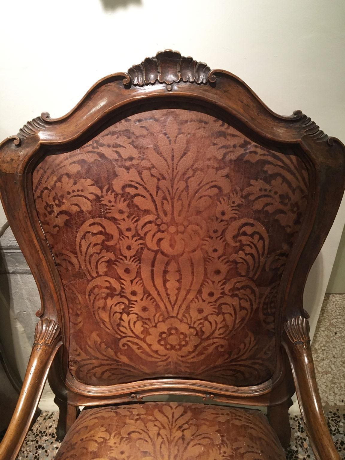 photo furniture 1750 Venezia Pair Of Armchairs In Carved Walnut Original Embossed Leather Covers