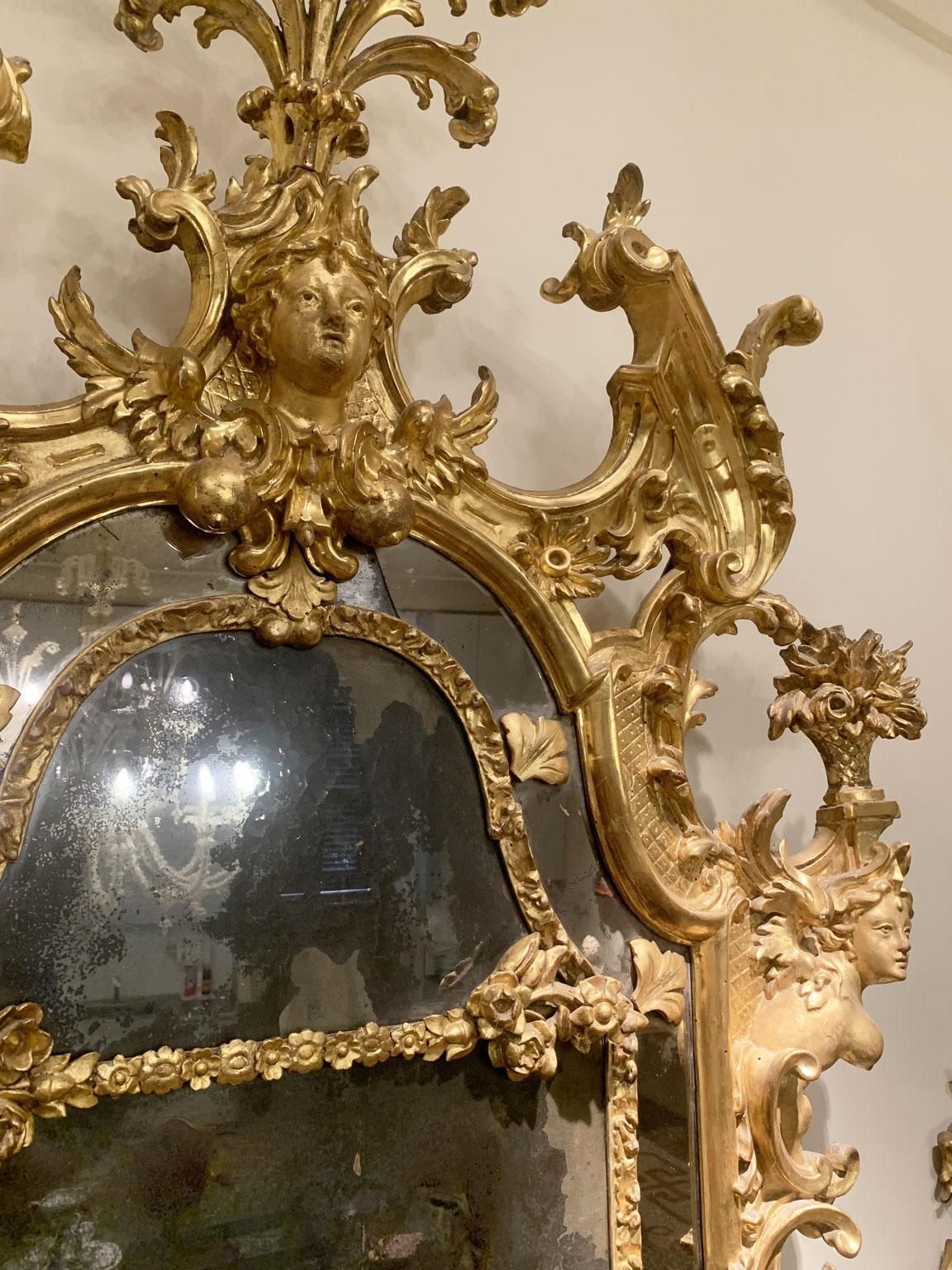 photo for sale Italy Early 18th Century Barocco Giltwood And Carved Fireplace Mirror