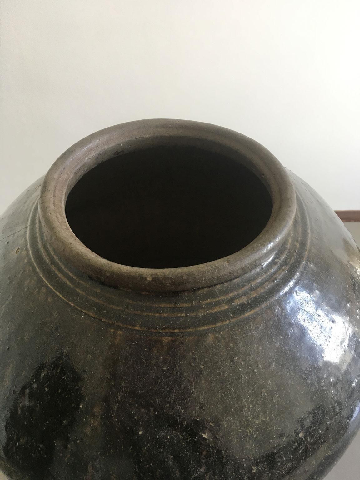 photo for sale Late 18th Century Khmer Brown Glazed Terracotta Vase