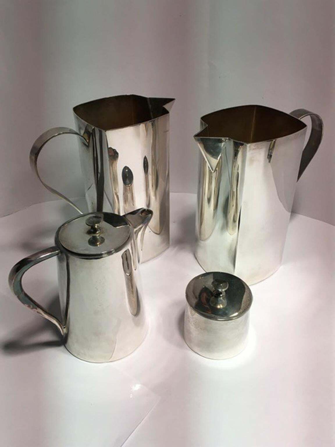 Set Of Four Pieces Pair Silver Plate Water Carafes Coffee Pot And Sugar Bowl photo furniture