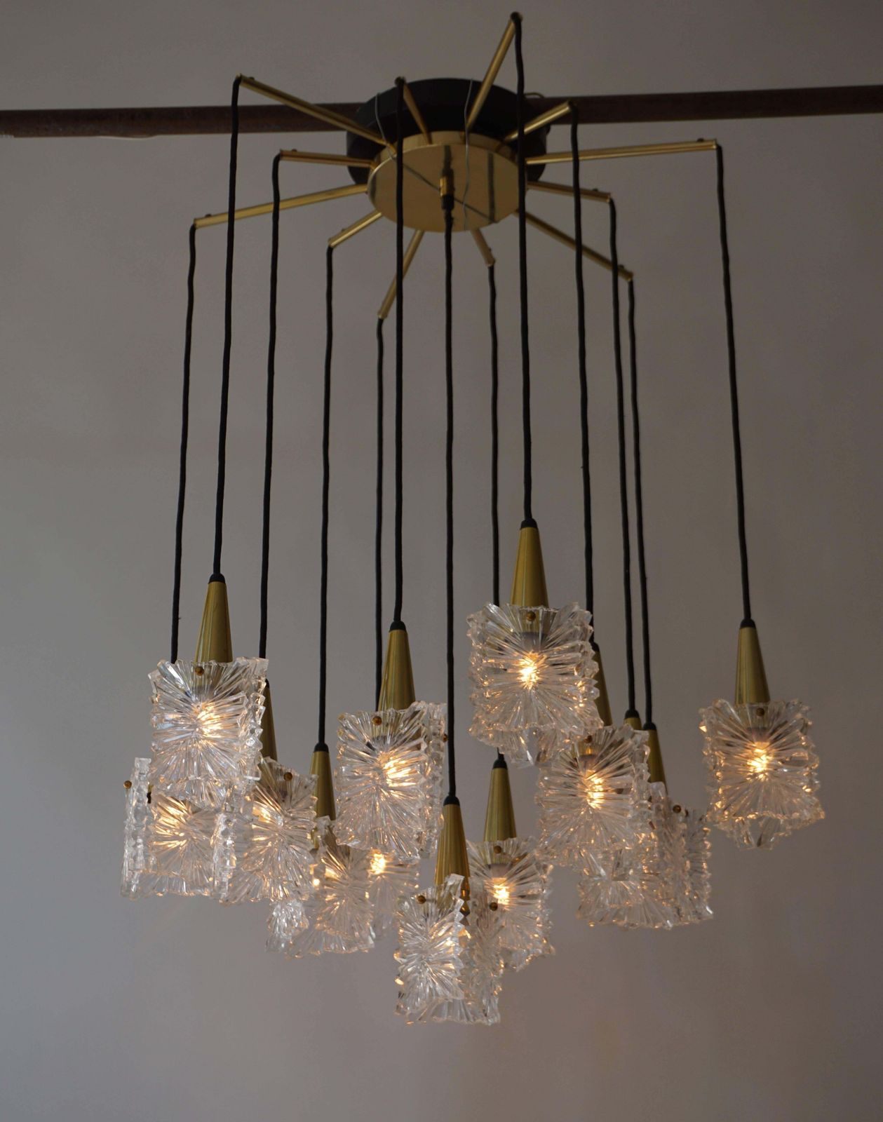 Chandelier In Glass And Brass By Raak photo Lighting