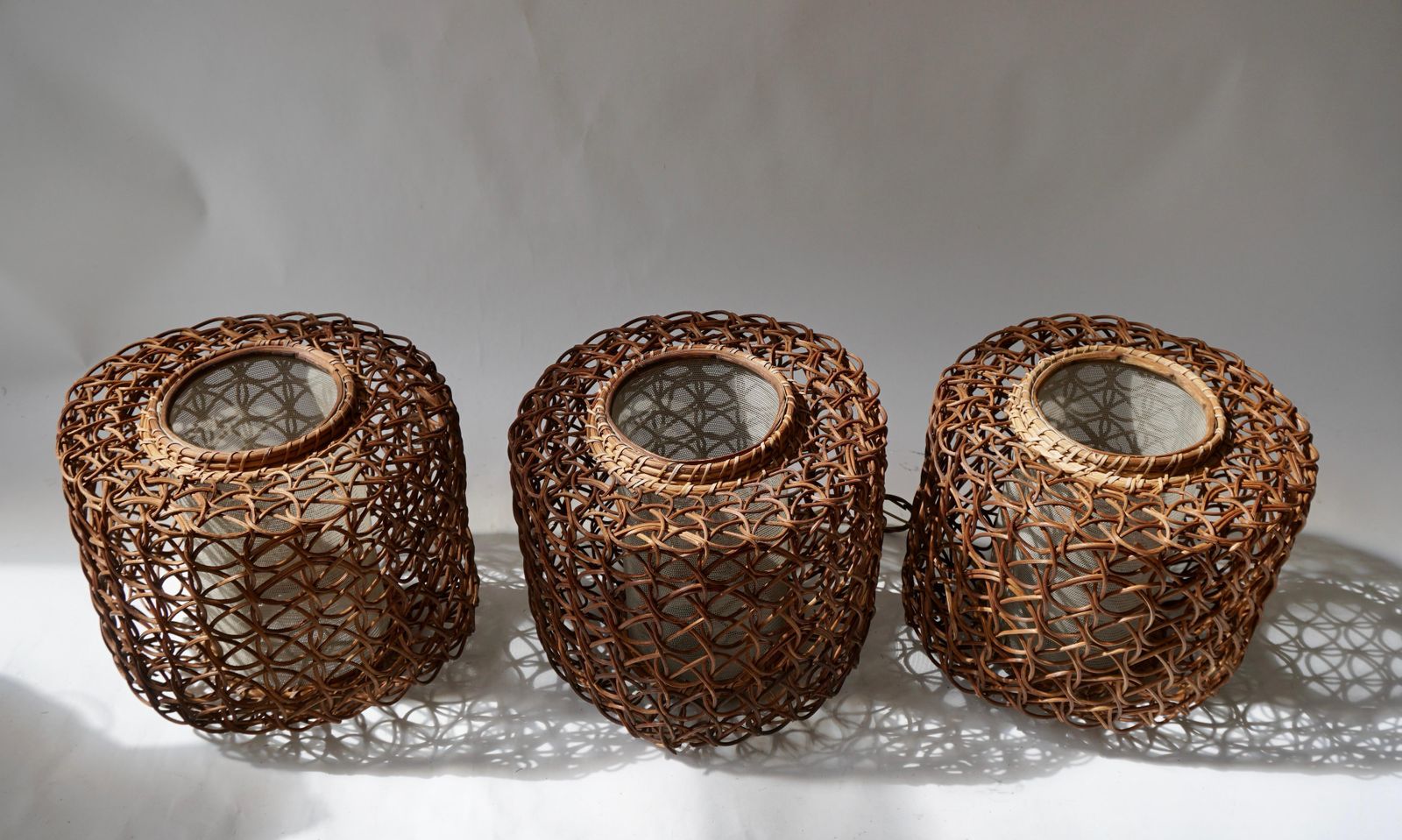 photo furniture Three French 1950s Vintage Rattan Pendant Light