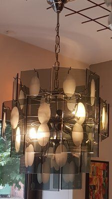 Mid Century Chandelier With Frosted Glasplates And Relief photo for sale