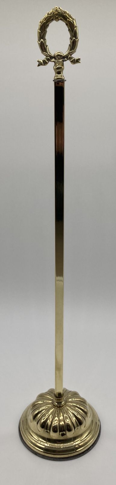 A Late 19th Century Tall Brass Door Porter