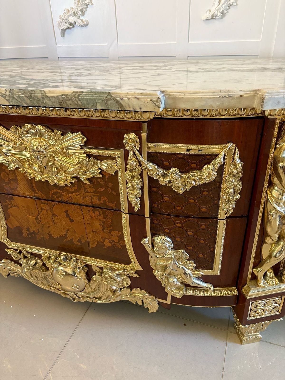 photo for sale Antique Rare Fine Pair Of French Marquetry And Gilt Bronze Mounted Commodes In The Louis XVI Style, After Jean Henri Riesener