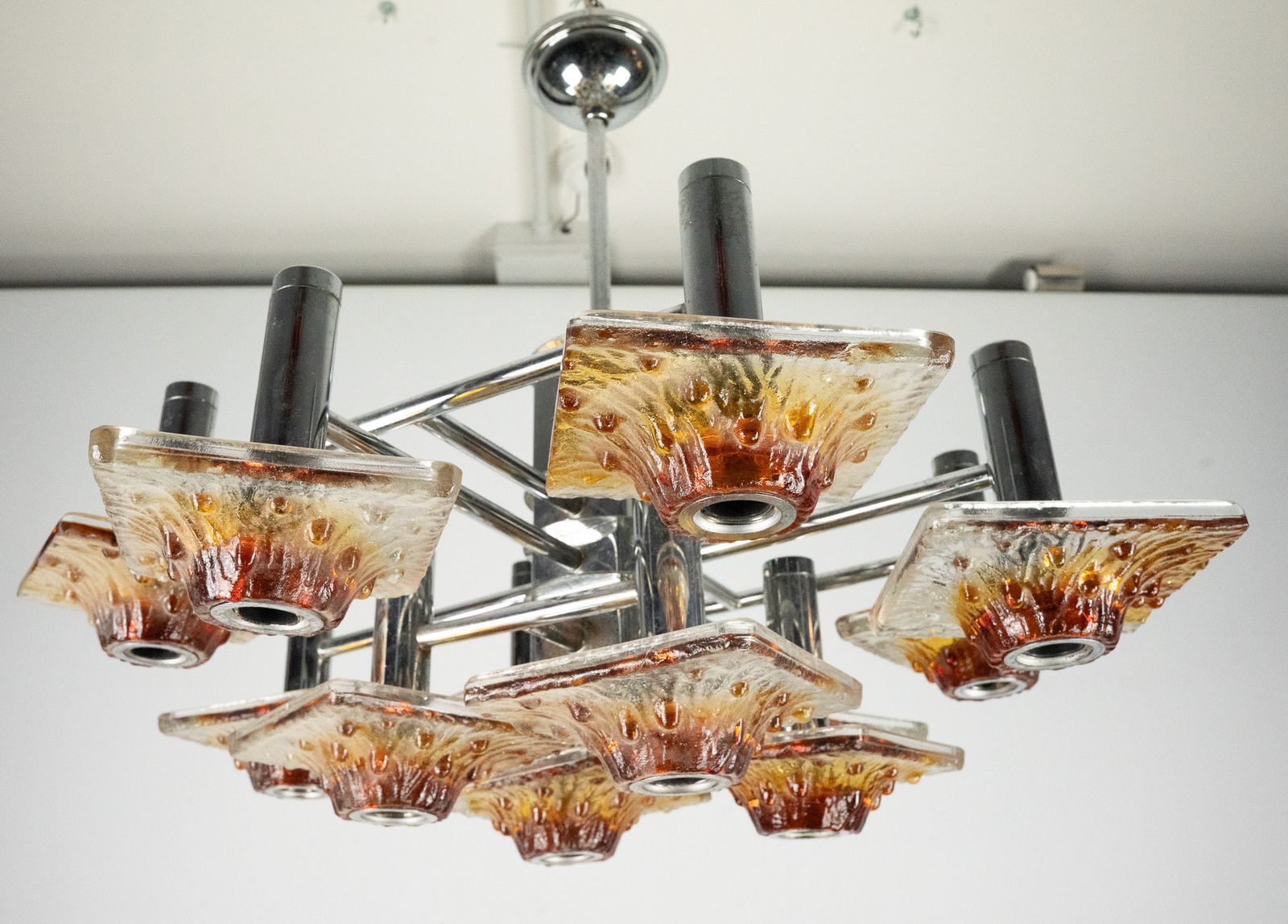 photo furniture 12 Light Mazzega Chandelier In Amber And Clear Murano Glass And Chrome. Italy 1970s