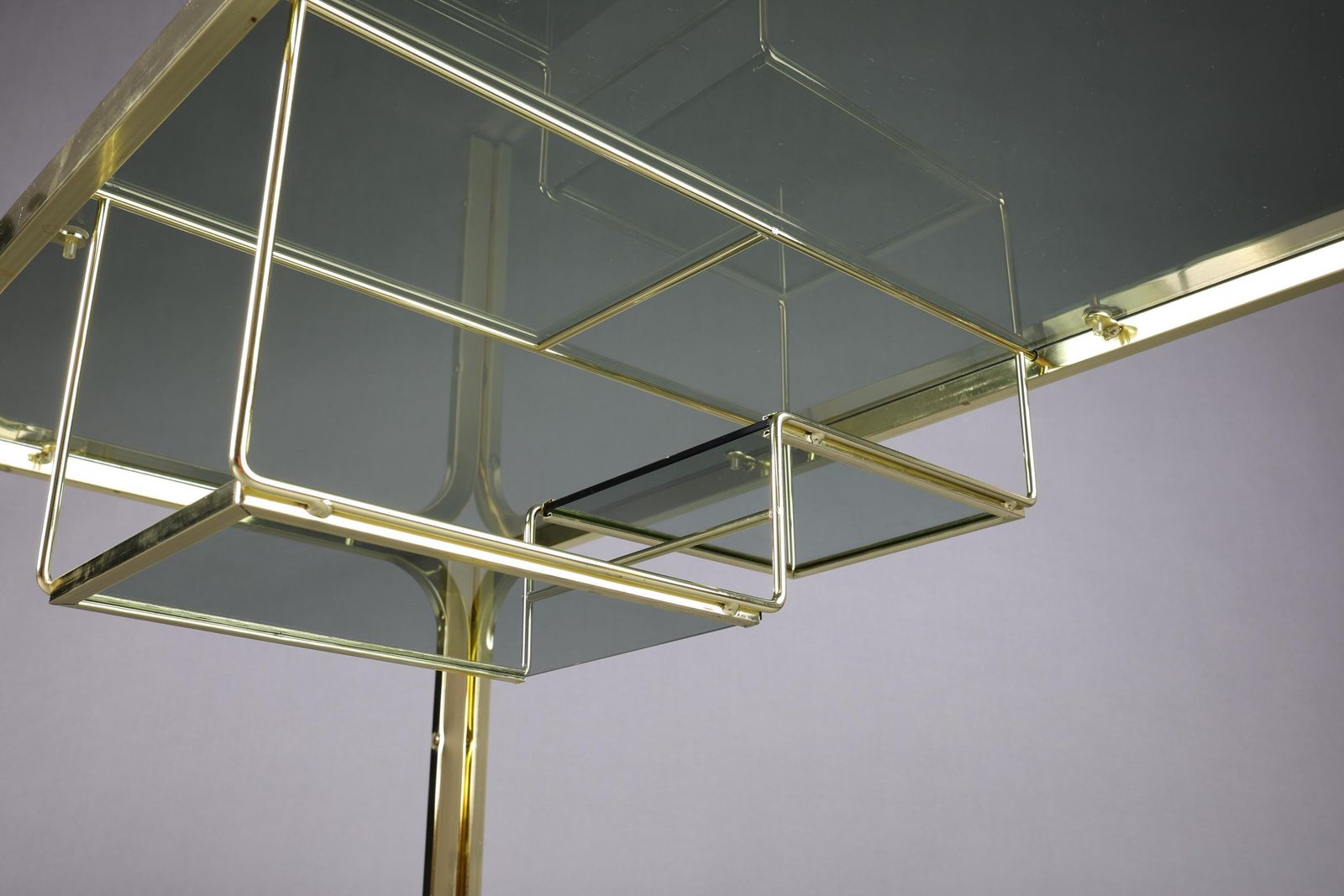 photo for sale Vintage 1970s Smoked Glass Coffee Table With Gold Accents | Glass Top Table For Living Room | Rectangular Coffee Table With Storage Shelf