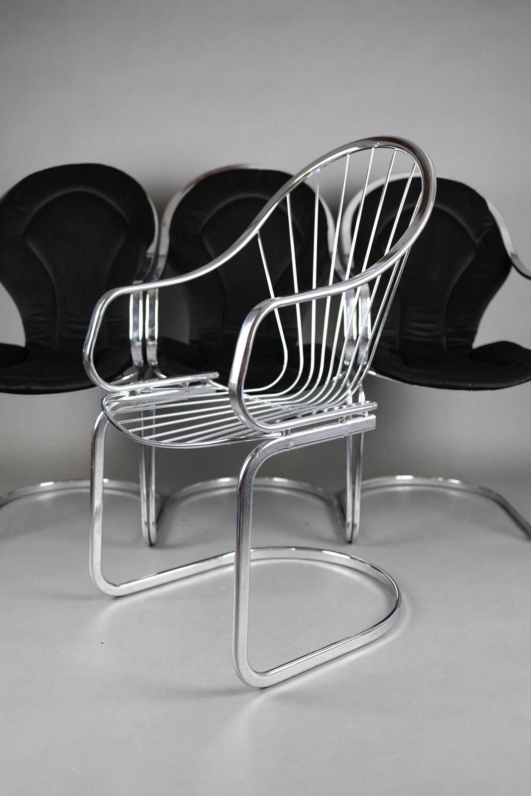 1970s Gastone Rinaldi Chrome Dining Chairs Set Of 4 | Mid Century Modern Furniture | Retro Dining Chairs With Black Cushions photo furniture
