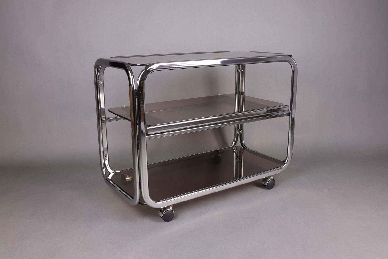 1970s Smoked Glass Side Table | Chrome Rolling Console | Vintage Mid Century Modern Trolley | Vintage Glam Accent Table For Living Room photo furniture
