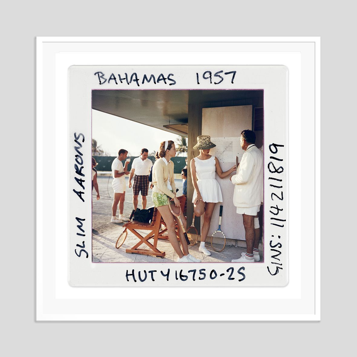 Slim Aarons 'Tennis In The Bahamas Slide' Framed White photo furniture