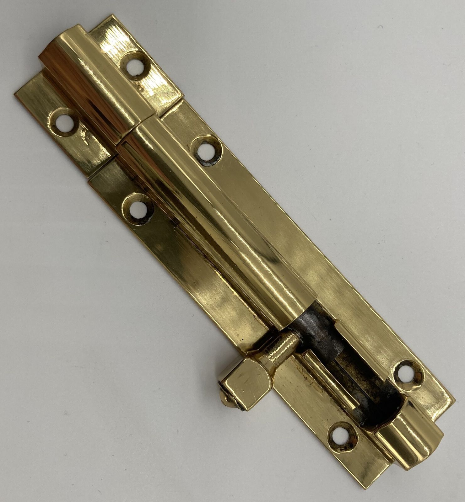 A Small Brass Door Bolt photo for sale