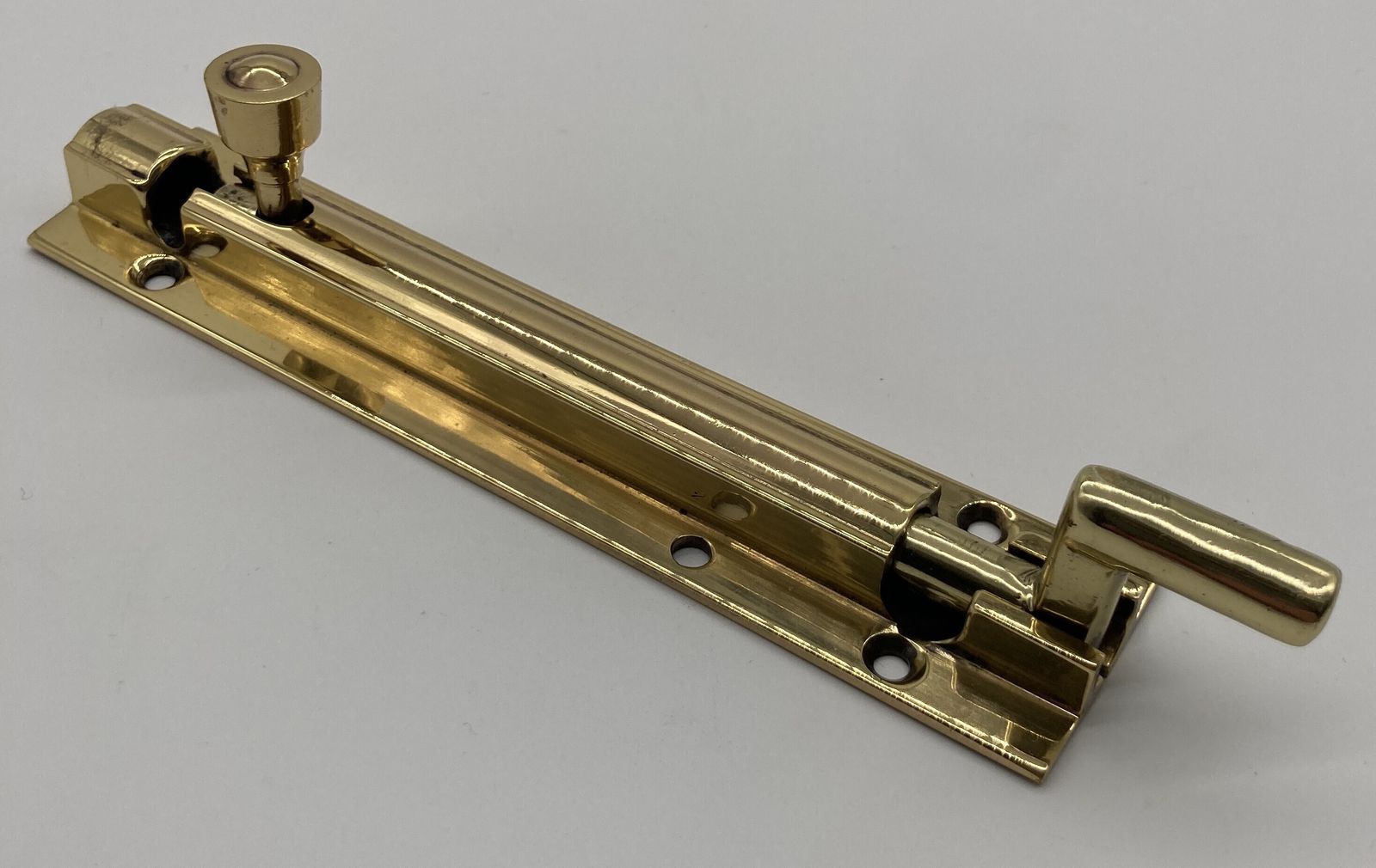 A Small Brass Crank Door Bolt, 1920s photo Home Fixtures