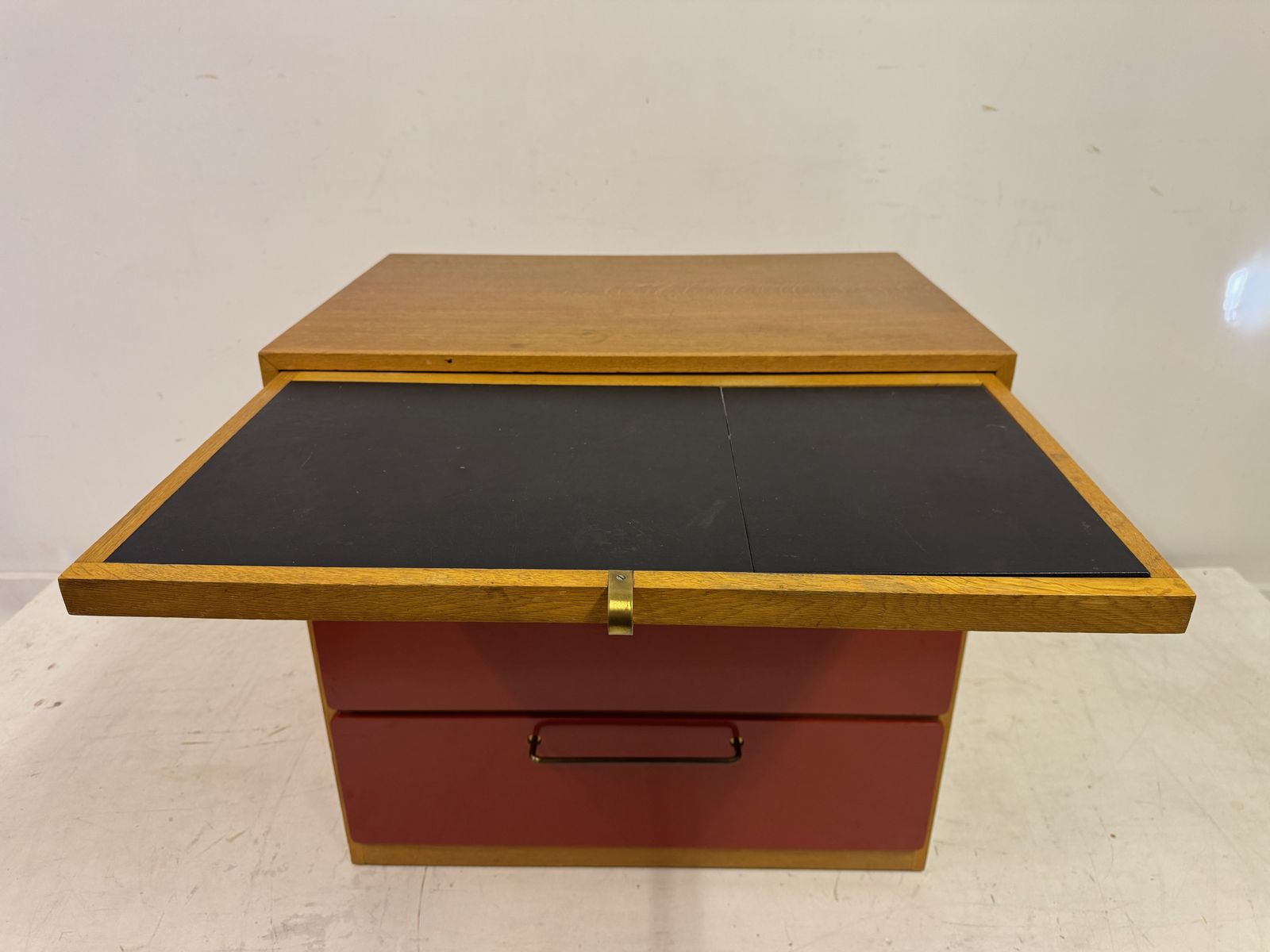 1960s Red Chest Of Drawers With Pull Out Slide By Heals photo vintage