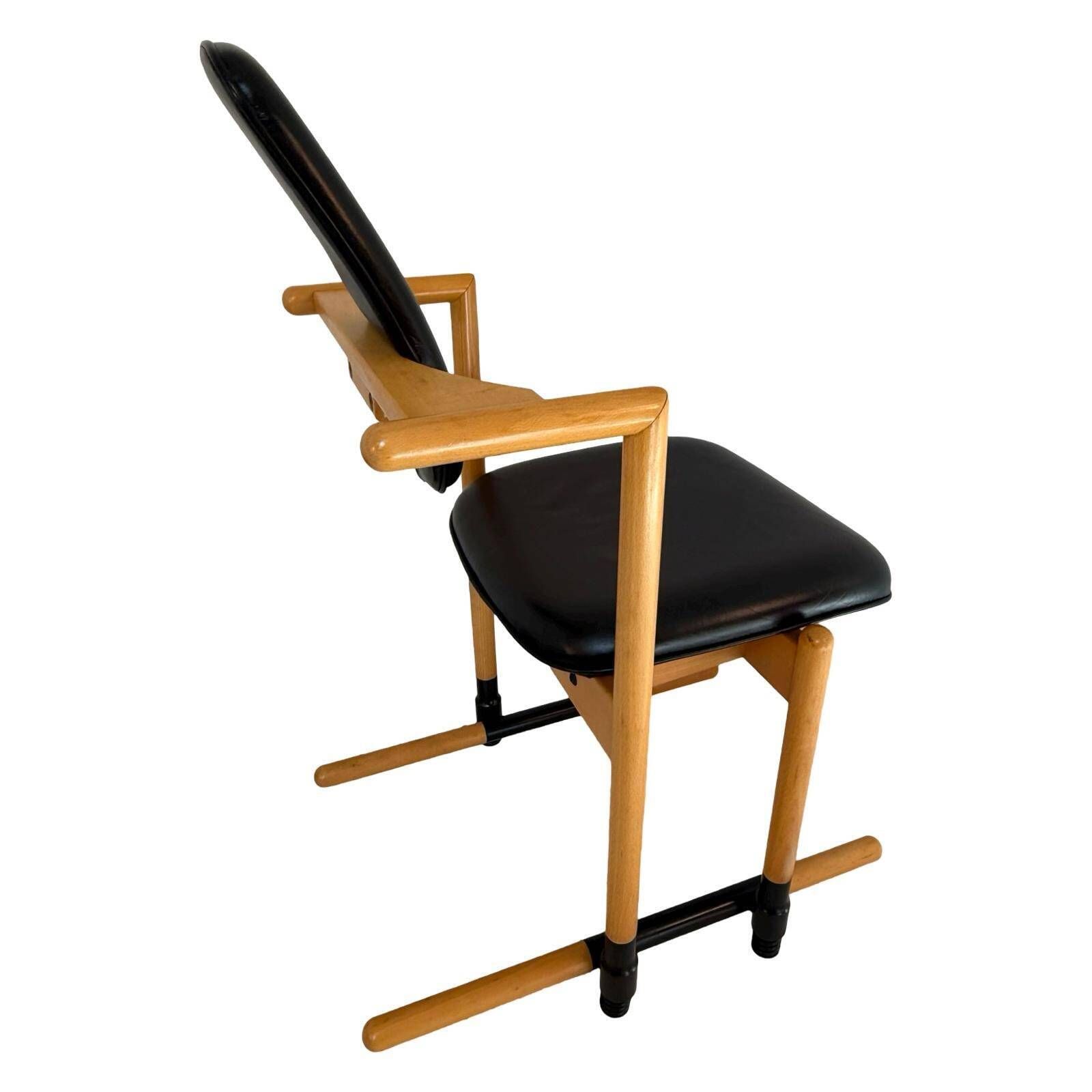 Peter Opsvik   Stokke   Flysit   Ergonomically Shaped Rocking Chair   Black Leather Upholstery And Wooden Frame photo vintage