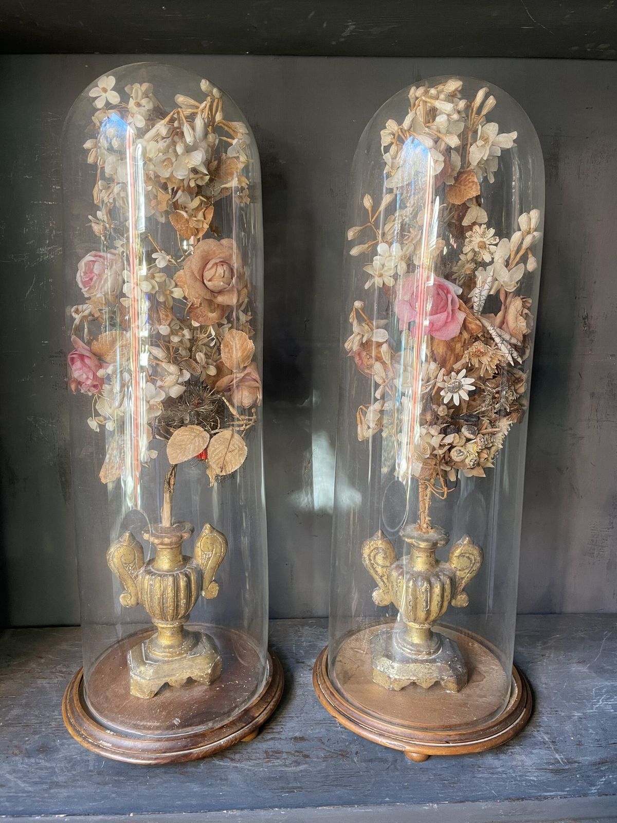 Pair Of 19th Century Glass Domes With Gilded Appliqués And Paper Flowers.