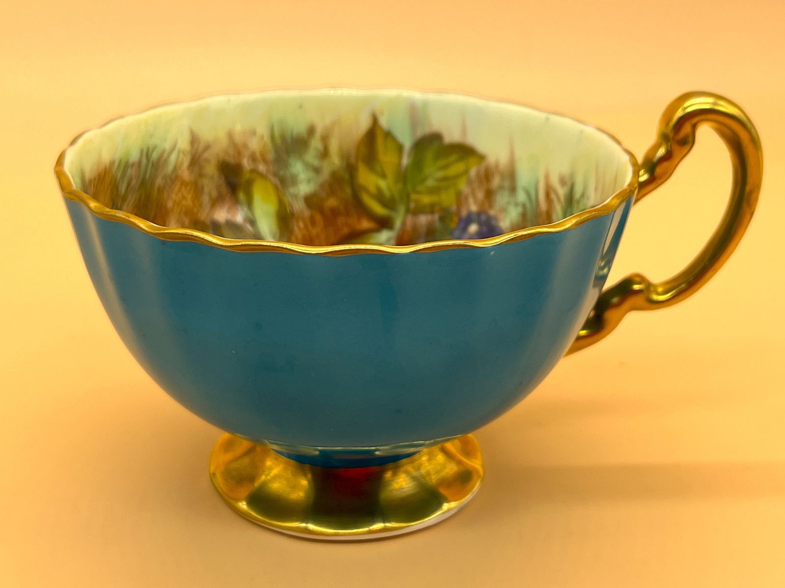 photo furniture Aynsley China Orchard Gold Fruits Signed D Jones Oban Shape Turquoise And Gold Cabinet Tea Cup & Saucer Duo. 1034.