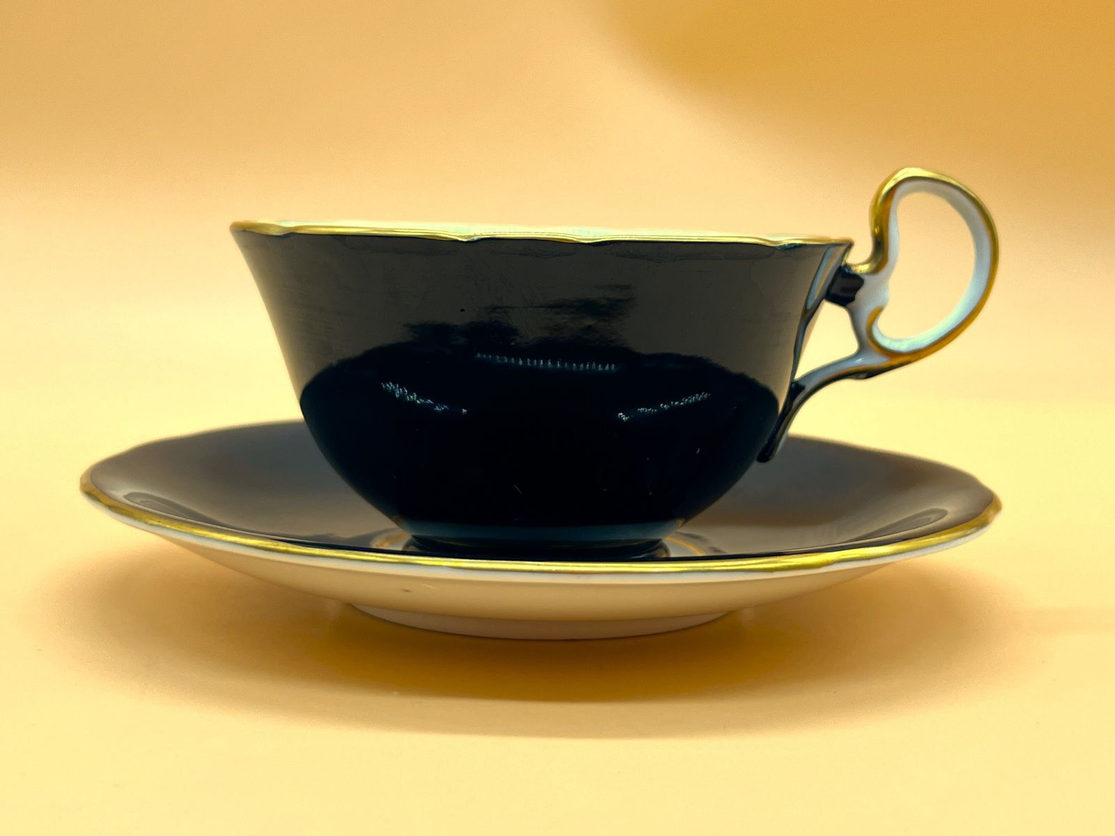 95.0 Aynsley China Orchard Gold Fruit Signed D Jones High Doris Shape Black And Gold Cabinet Tea Cup & Saucer Duo. C1952 63. photo