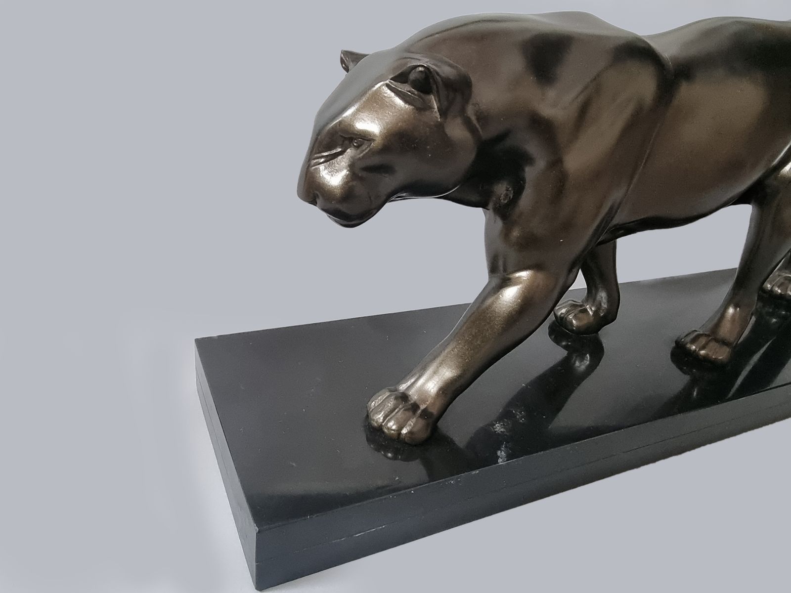 Large French Art Deco Sculpture Of A Spelter Panther Set On A Black Marble Base photo furniture