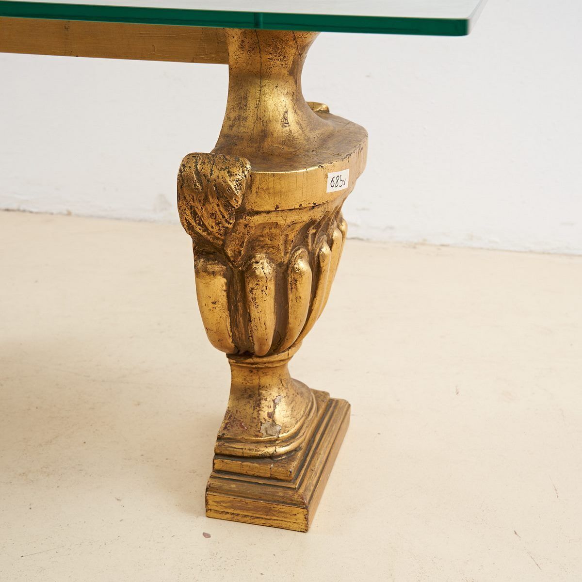 Glass Top Coffee Table With Gilded Wooden Capitals photo for sale
