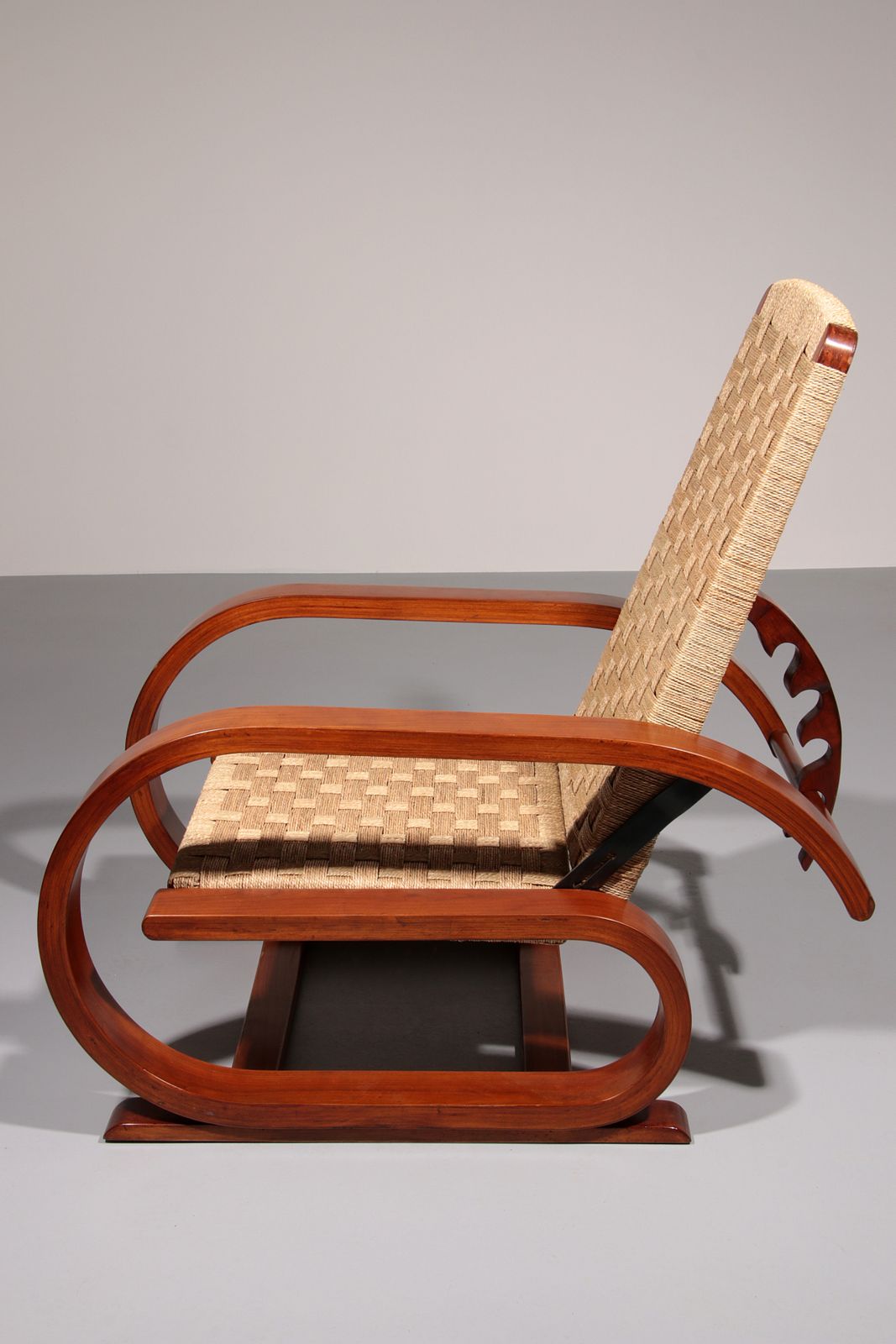 An Exceptionally Rare Mahogany Recliner Crafted In Italy During The 1950s" photo furniture