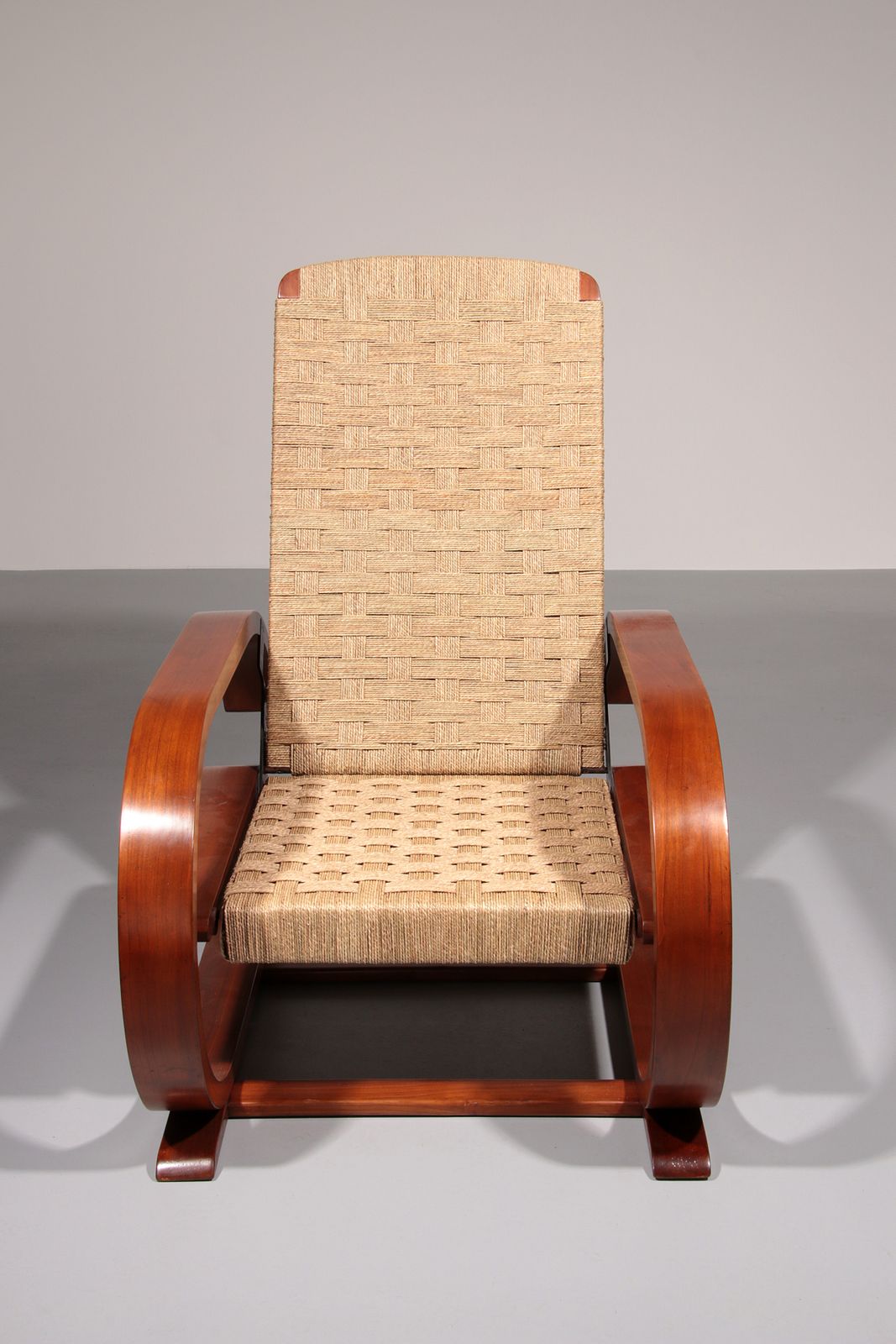 An Exceptionally Rare Mahogany Recliner Crafted In Italy During The 1950s" photo vinterior