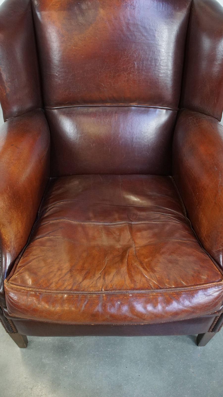 Vintage Schapenvacht Fauteuil Met Uitstekend Zitcomfort En Mooie Patina photo vinterior