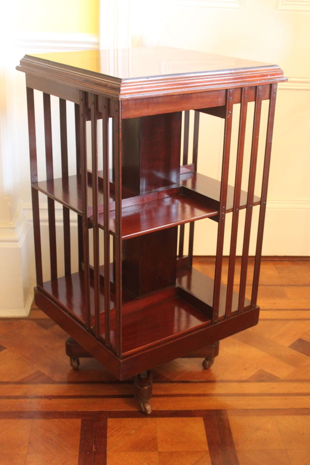 An Edwardian Mahogany And Inlaid Revolving Bookcase photo for sale