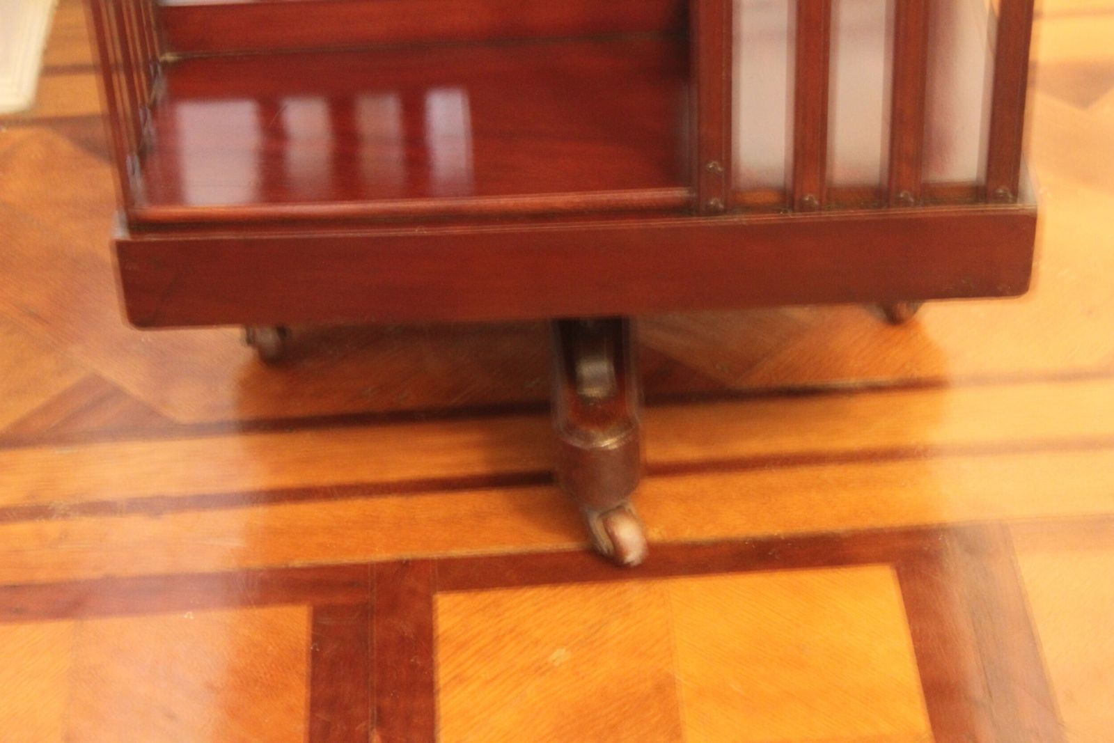 An Edwardian Mahogany And Inlaid Revolving Bookcase photo buy