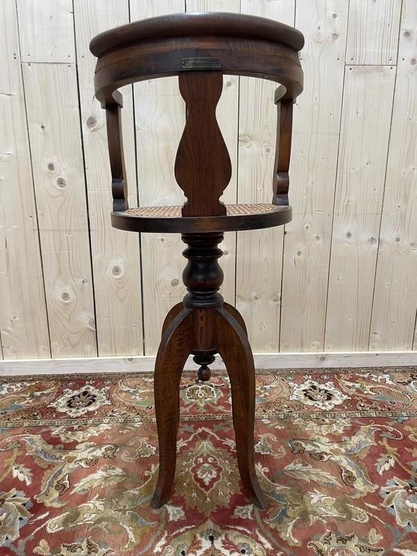 Fauteuil De Coiffeur En Cannnage Paul Tournay photo for sale