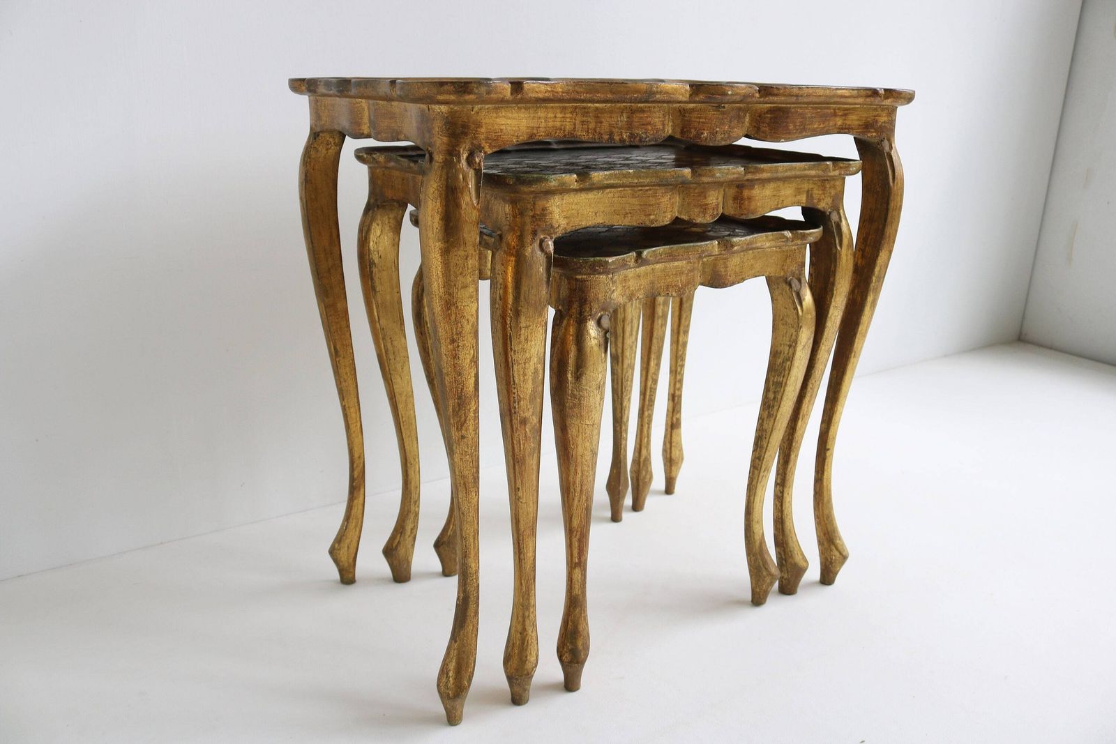 Graceful Set Of Three Italian Florentine Gold Hollywood Regency Wood Stacking Nesting Tables Additional Tables Side Tables Set Tables 1960s photo Furniture