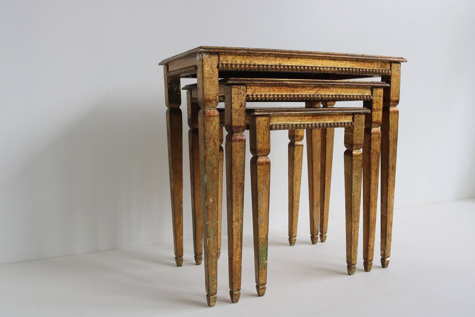 Set Of Three Italian Florentine Gold Hollywood Regency Wood Stacking Nesting Tables Straight Legs Additional Tables Side Tables 1960s photo Furniture