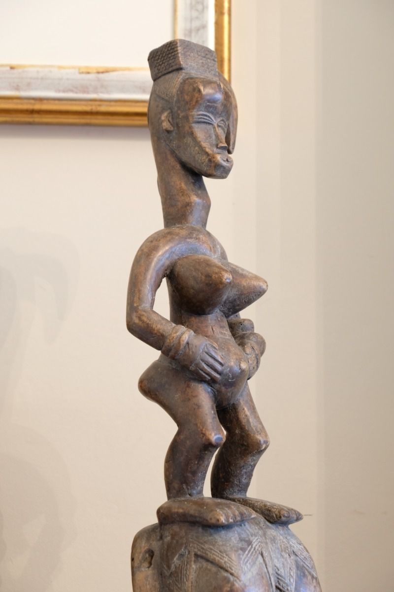 photo furniture Carved African Guro (Gouru) Fertility Figure Sculpture On Stand