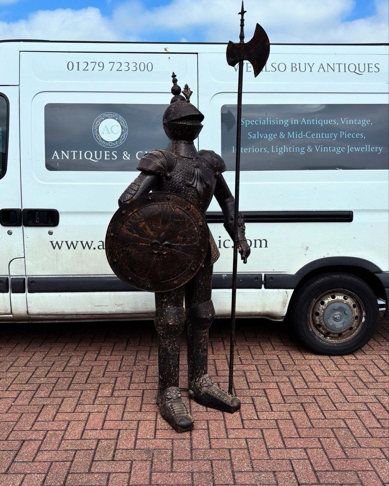 Suit Of Armour. Large And Impressive And Made Of Metal. photo vintage