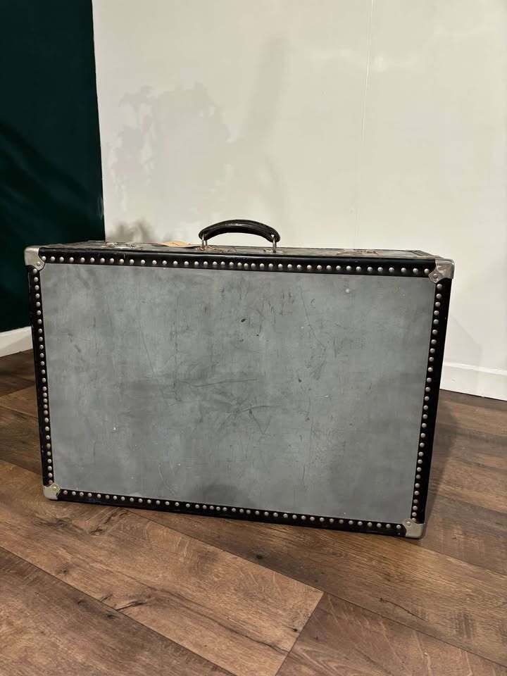 photo furniture Vintage Metal Clad Trunk With Leather Handle