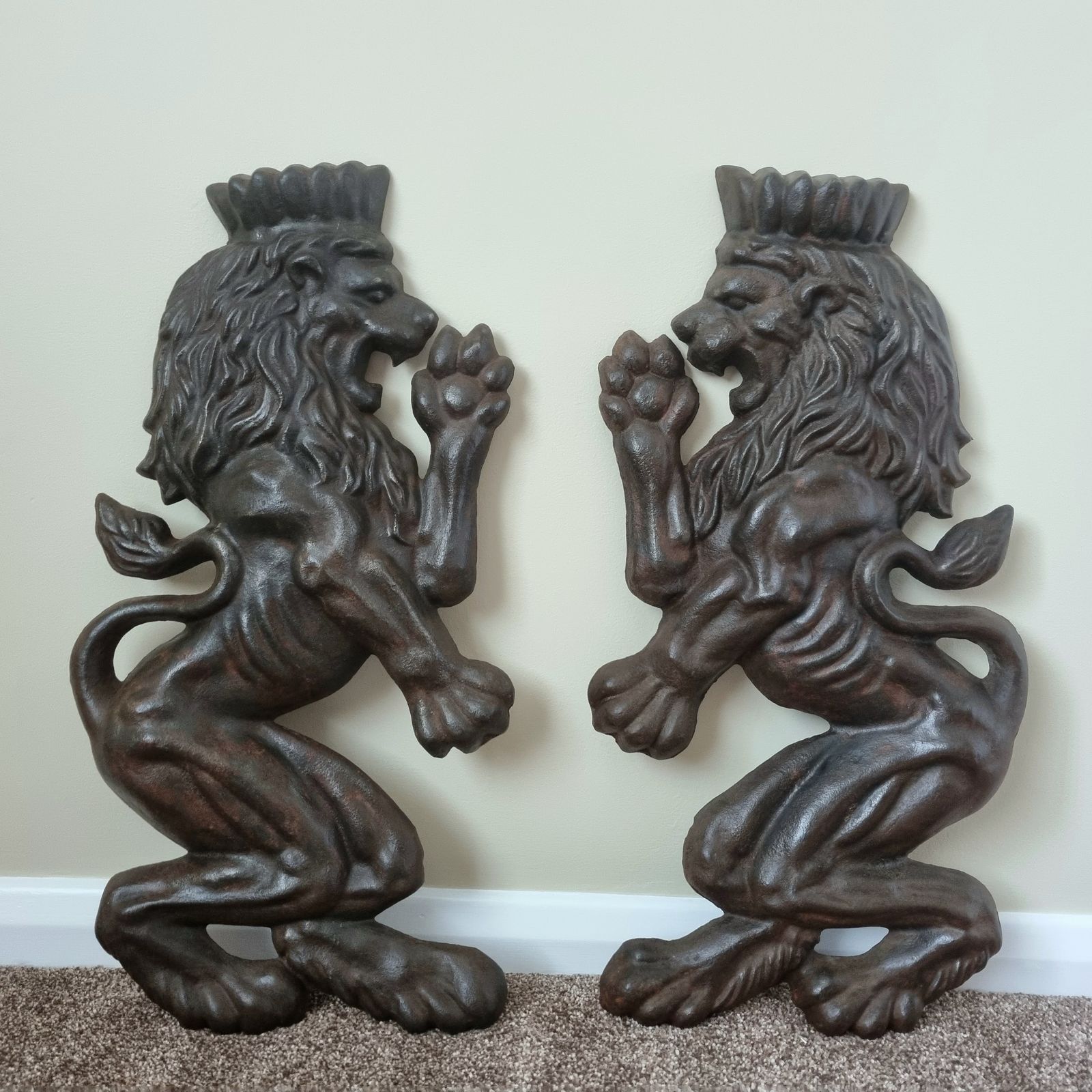A Large And Imposing Pair Of Cast Iron Heraldic Rampant Crowned Lion Mounts, Ideal For A Variety Of Architectural Or Decorative Applications.