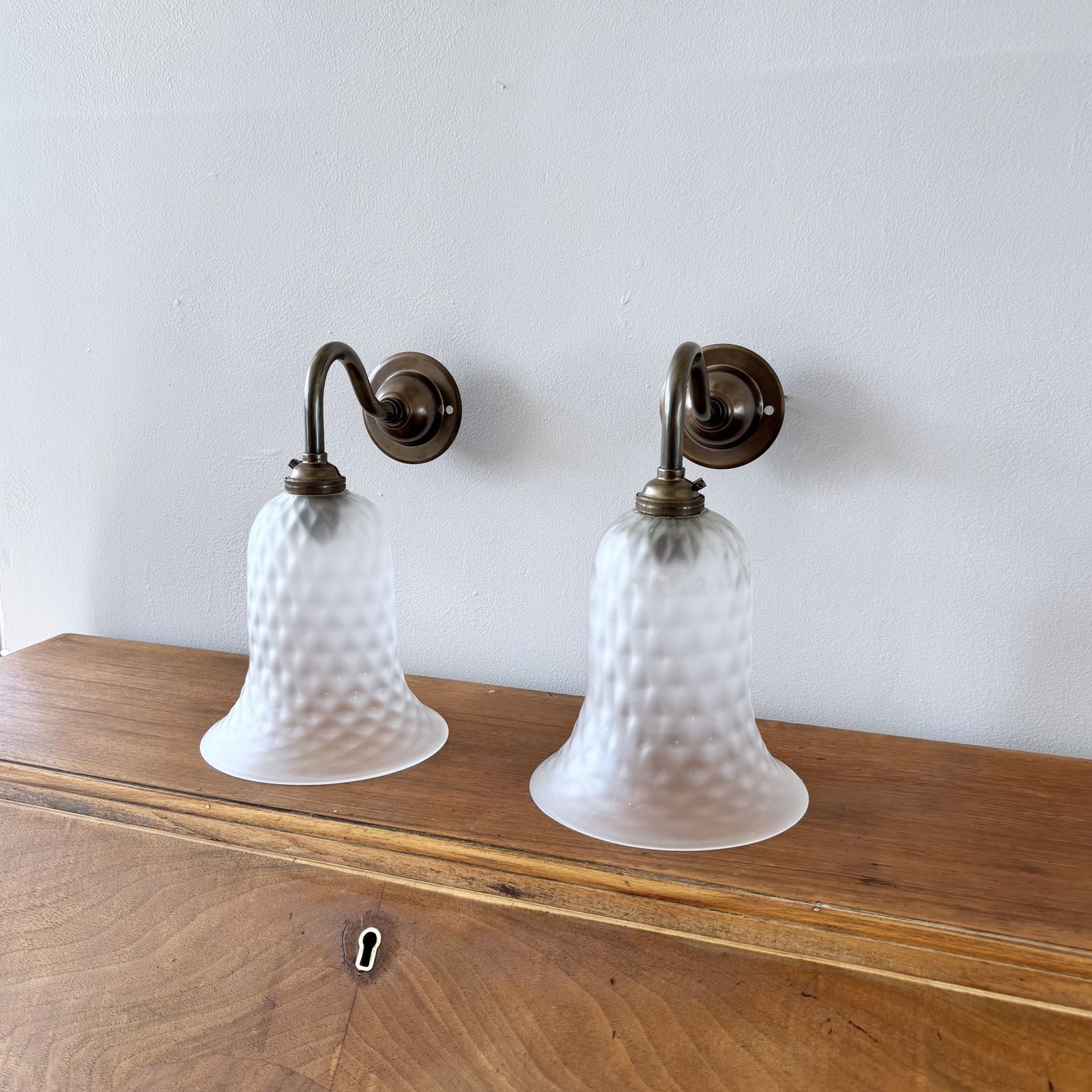 Pair Of Frosted Bell Glass Shade Wall Lights In Antique Brass photo furniture