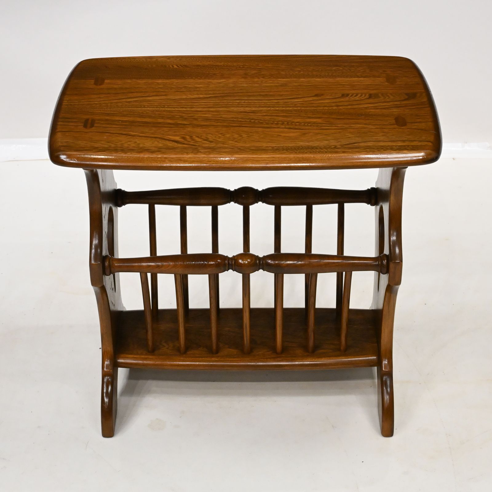 photo vintage Ercol Magazine Rack Golden Dawn Finish Free* Uk Delivery