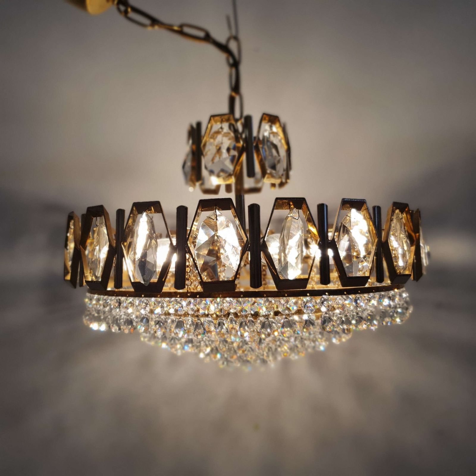 A Swedish Gilded Metal & "Fantastic" Cut Glass Chandelier. 1960s.