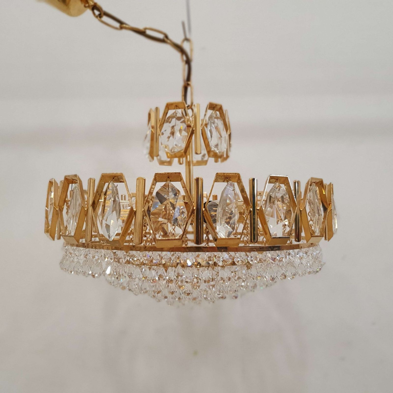 A Swedish Gilded Metal & "Fantastic" Cut Glass Chandelier. 1960s. photo 375.0