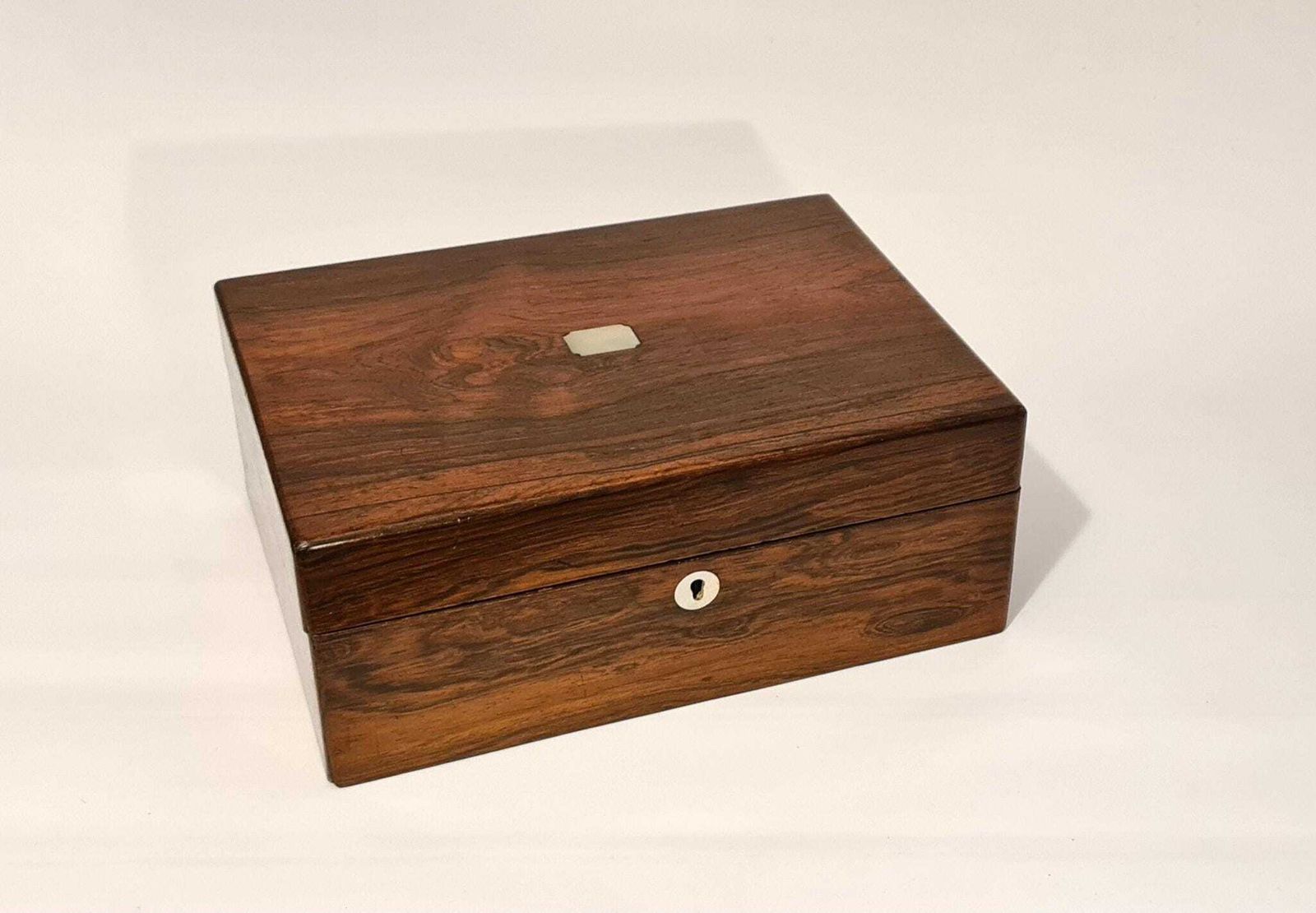 Antique Rosewood Box With Simple Mother Of Pearl Cartouche And Escutcheon. photo for sale