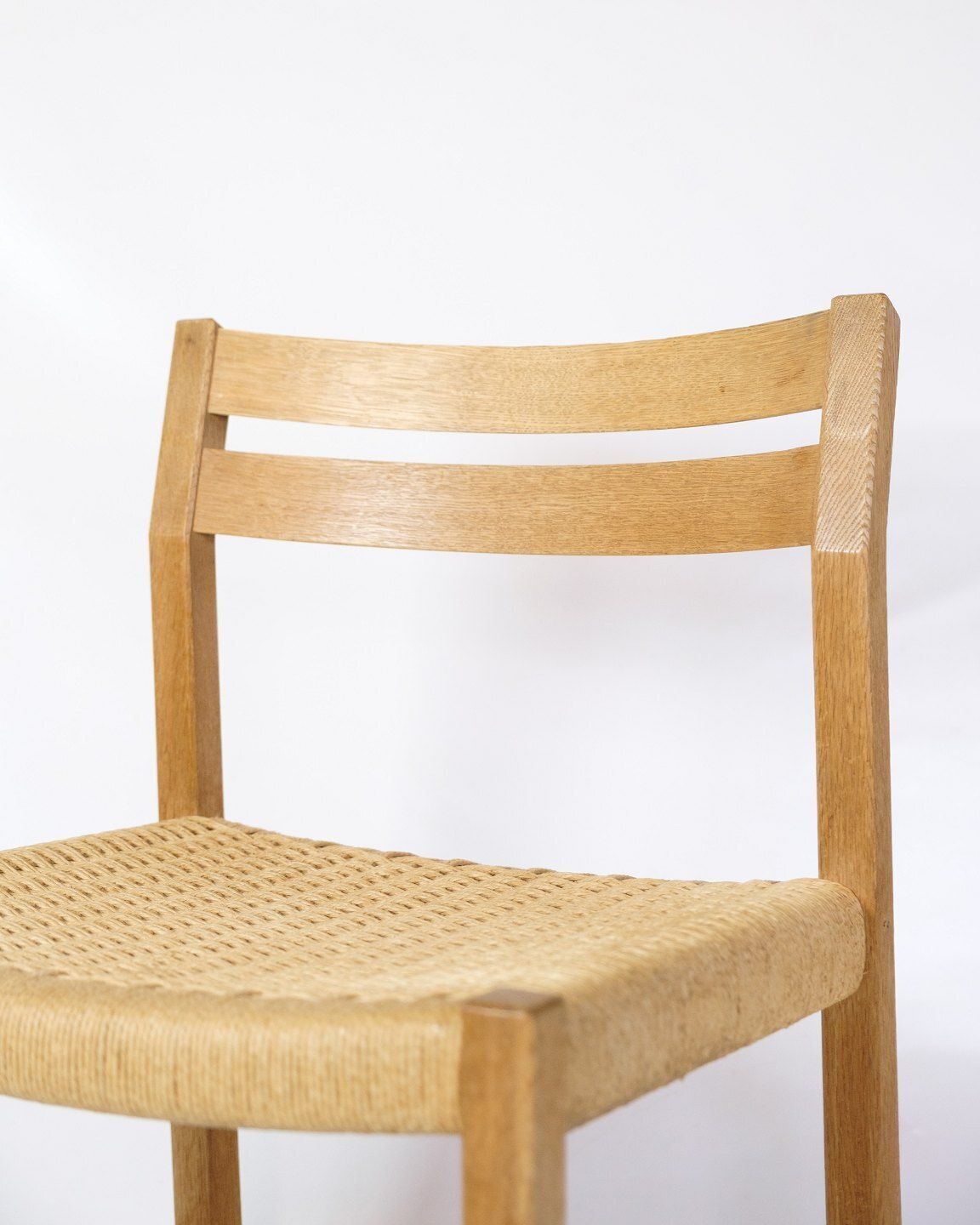 Set Of Five Dining Chairs Model 401 In Oak  & Plank Wicker By Jørgen Henrik Møller For Jl Møllers Furniture Factory  From 1960s photo Furniture