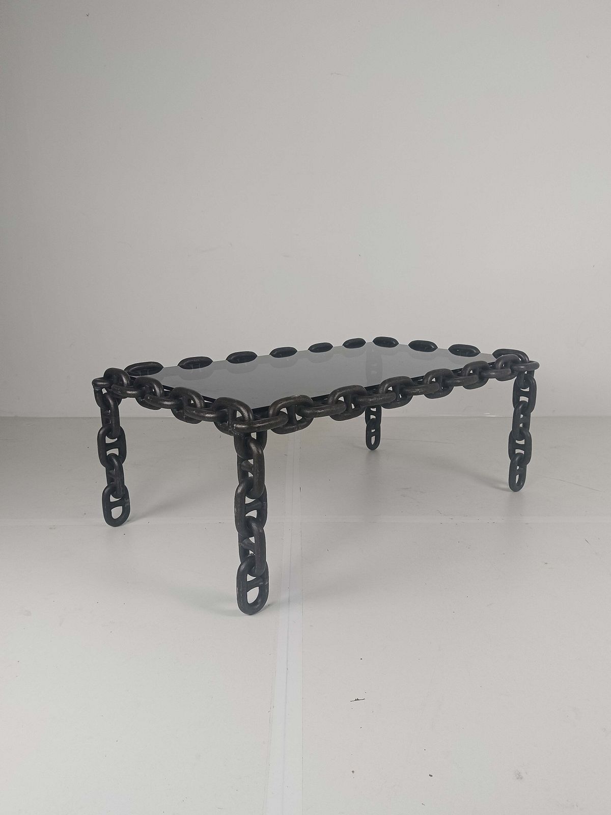 photo buy Vintage Brutalist Black Iron Chain Link Coffee Table With Original Smoked Glass, 70s